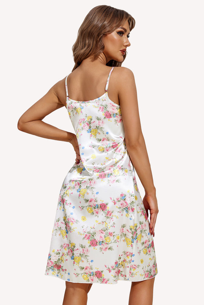 Floral satin slip dress with thin spaghetti straps, open back, knee-length