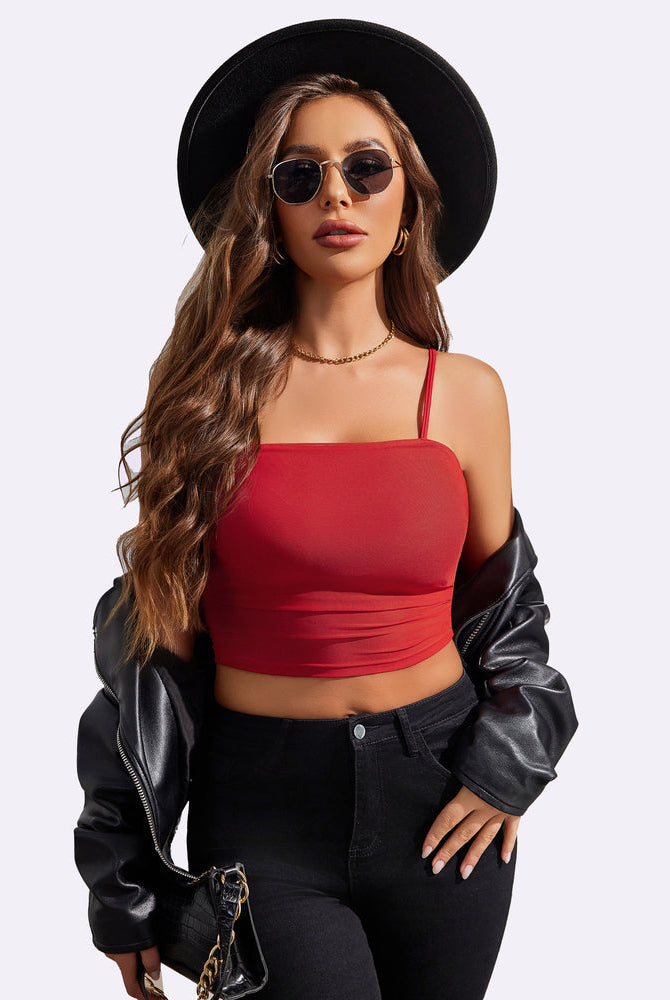 Red spaghetti-strap tank top with scoop neckline and ruched lower hem