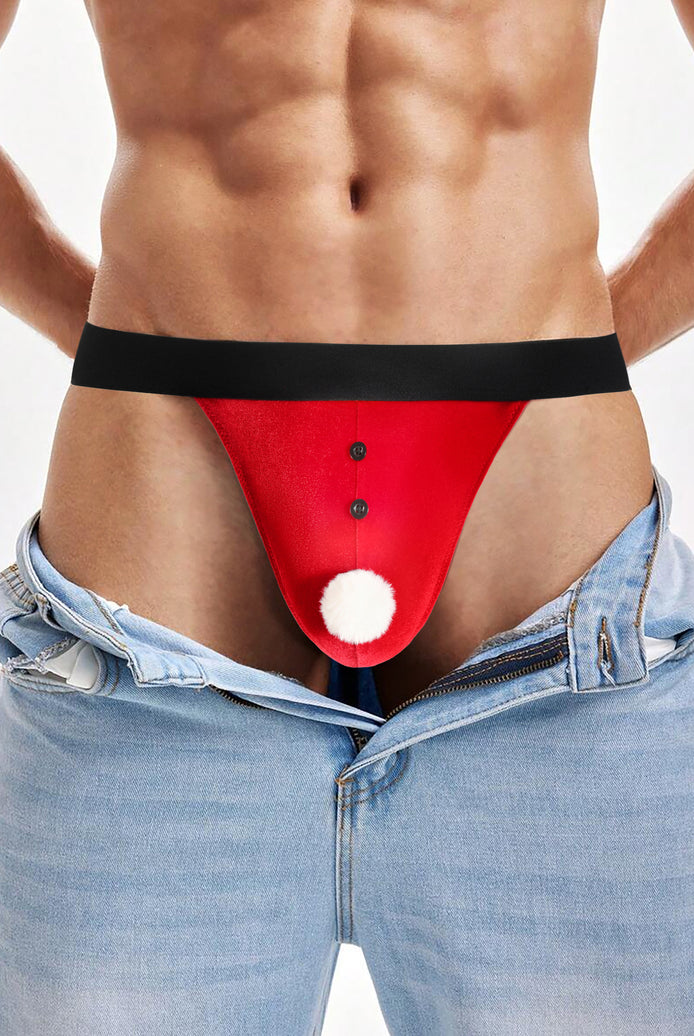 Red Santa g-string thong on model with black waistband and white pom-pom