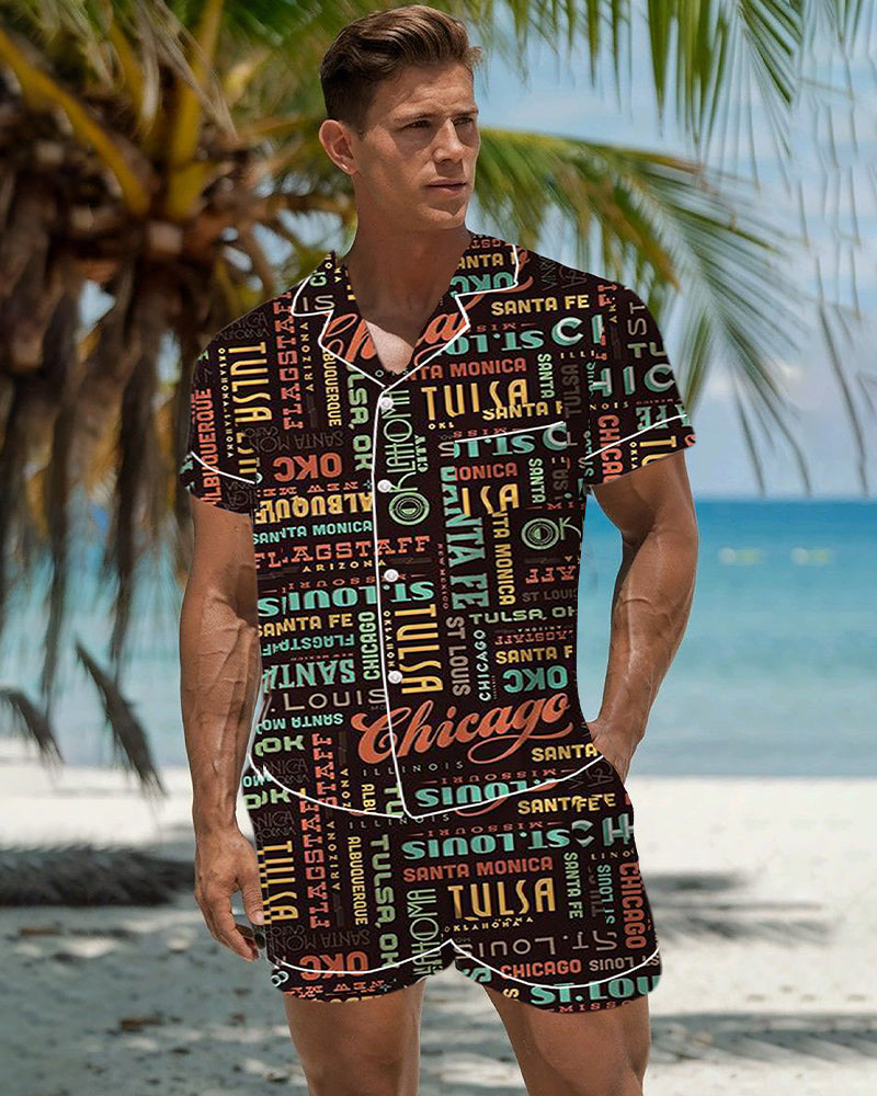Men’s satin pajama set in dark fabric with colorful retro city-word graffiti pattern, short set