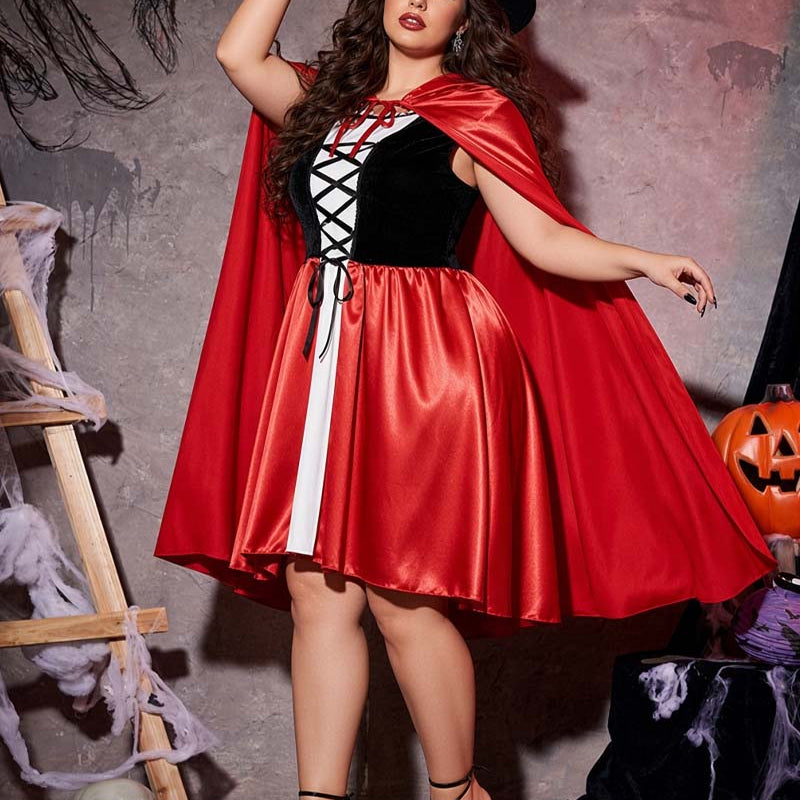 Plus-size witch costume dress with red satin cape, black bodice, and white lace-up front
