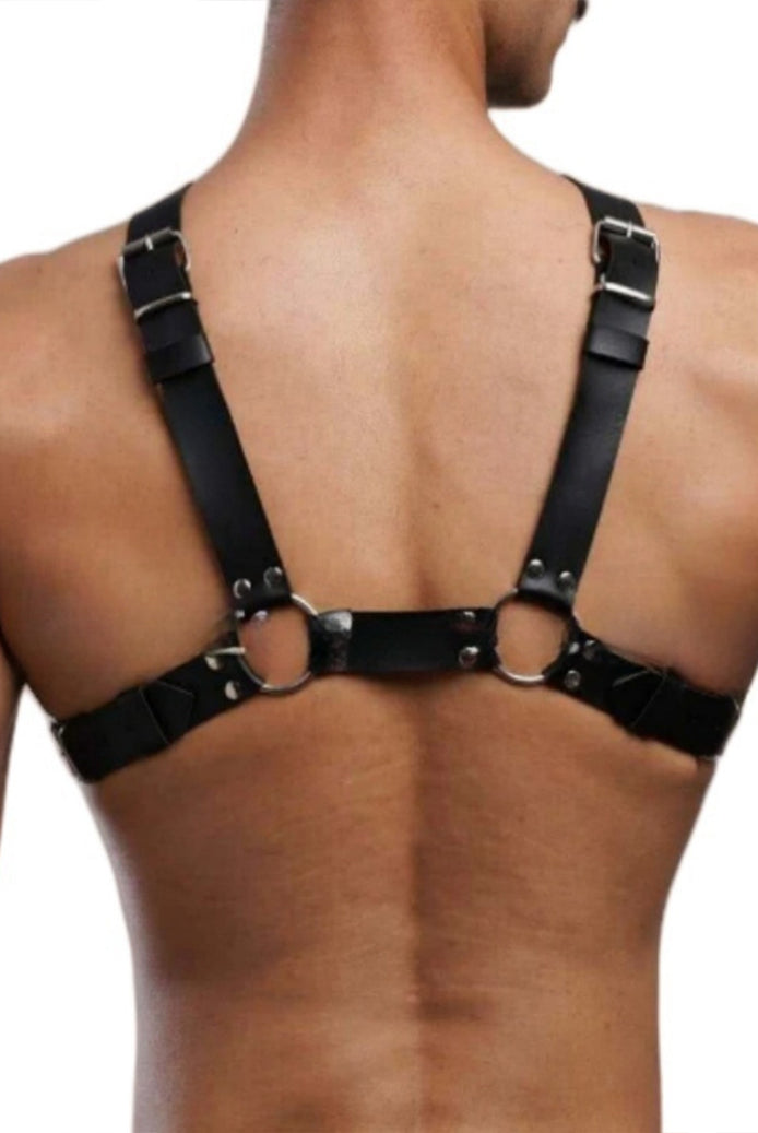 Men's faux leather body harness, black back view with O-ring connectors