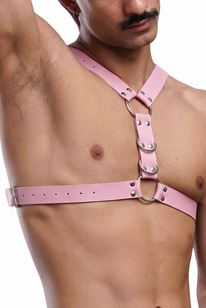 Men's faux leather body harness in pink with O-ring chest and shoulder straps