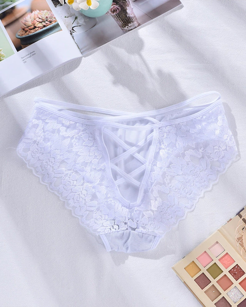 White lace triangle panties with scalloped lace trim and crisscross front