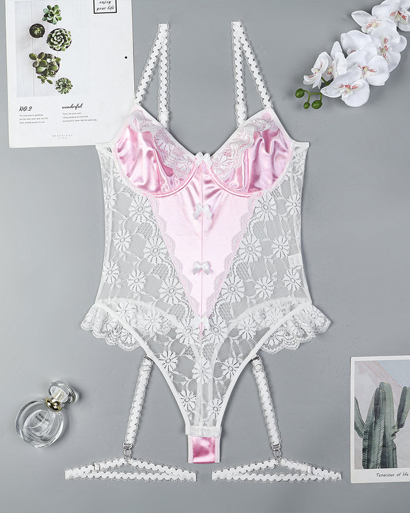 Pink lace bow mesh bodysuit flat lay with lace cups and garter-style straps
