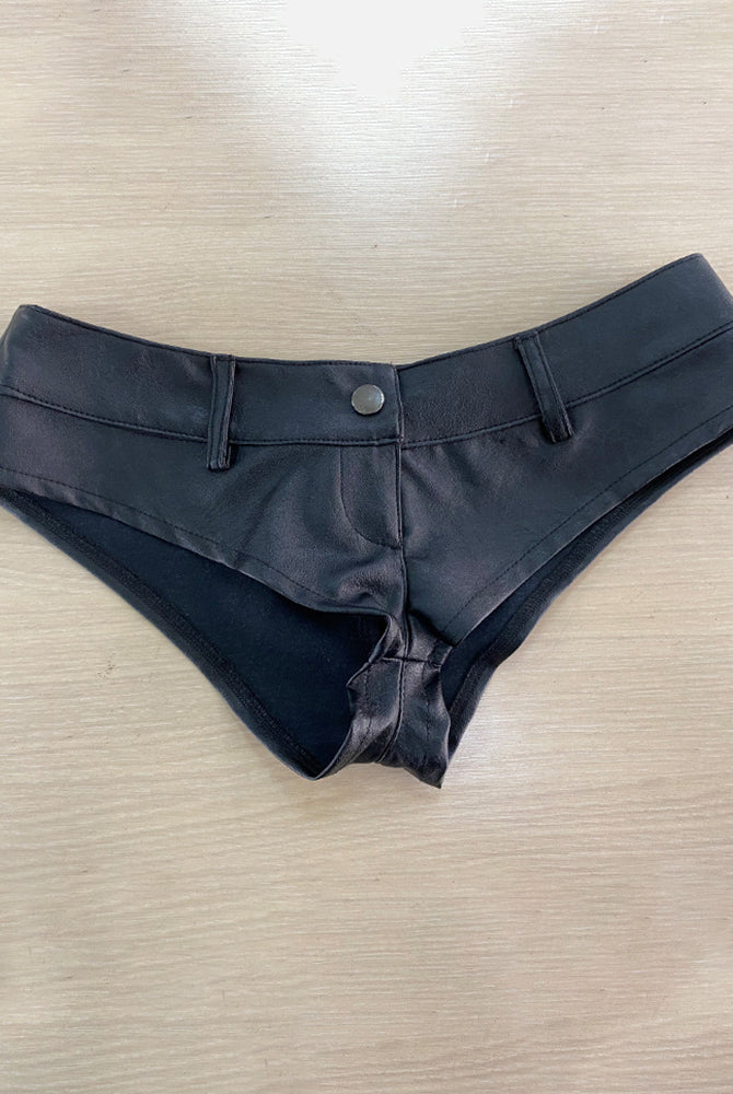 Dark blue faux leather low-rise booty shorts with center button and angled seams