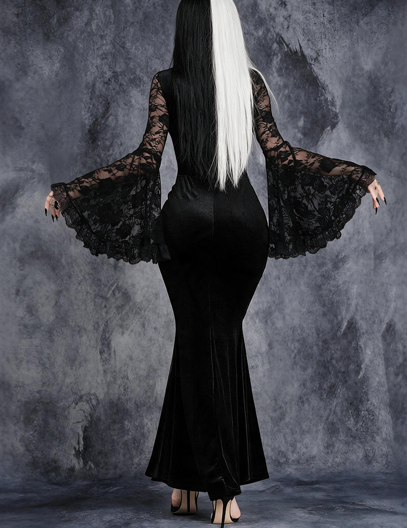 Black velvet mermaid dress back view with lace bell sleeves and flared hem.