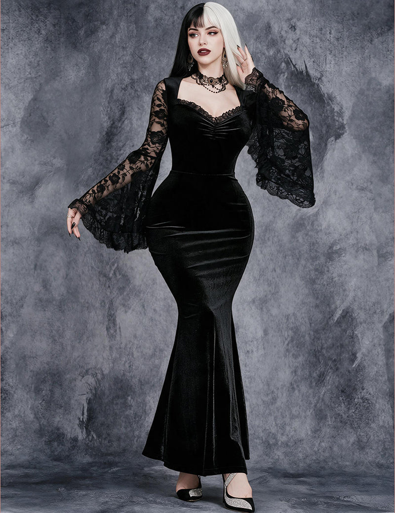 Black velvet mermaid dress with lace bell sleeves and ruched sweetheart bodice.