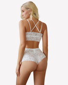White lace bra and matching lace panties set, crisscross back strap design