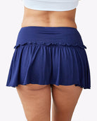 Dark blue ruffle mini skirt with elastic waistband and gathered hem