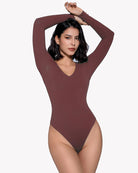 Burgundy long-sleeve double-lined bodysuit with deep V neckline, fitted high-cut