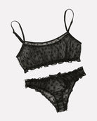 Black mesh dotted bralette and panty set, scalloped edges and adjustable spaghetti straps.