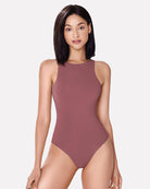 Double-lined bodysuit shapewear in mauve, sleeveless scoop neck with high-cut legs