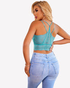 Turquoise V-neck racerback crop top with scalloped hem and crisscross straps