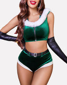 Green fuzzy velvet pajama set close-up: zip-front crop top, white trim, belt with high-waist shorts