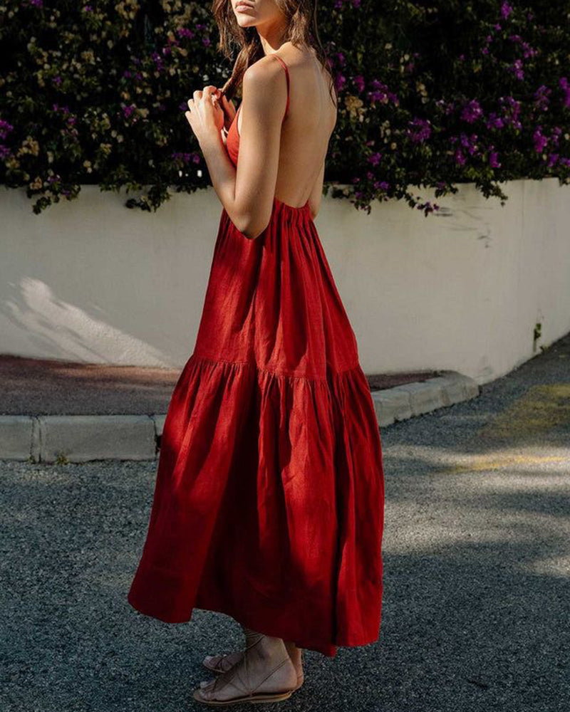 Red backless maxi dress with tiered skirt and spaghetti straps