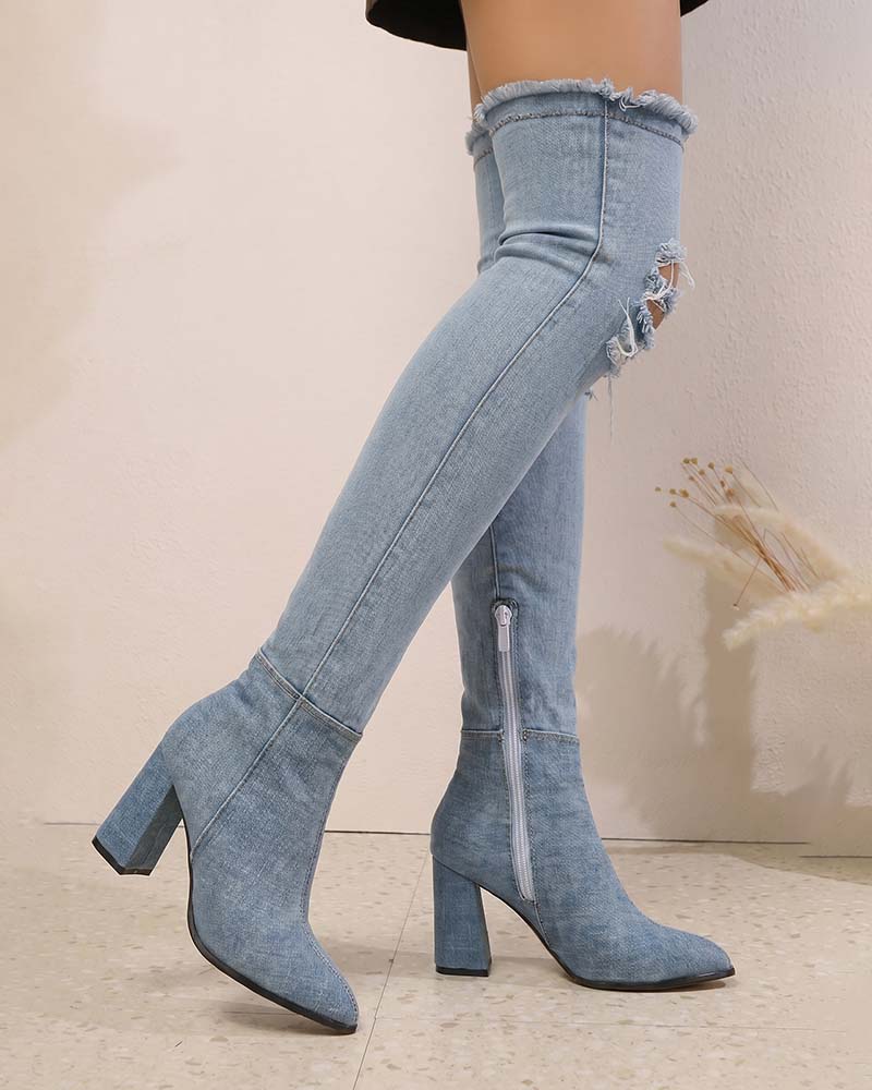 Light blue over-the-knee stiletto denim boots with distressed cuffs and side zipper