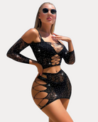 Black rhinestone fishnet lingerie set with sparkly fabric and long sleeve coverage