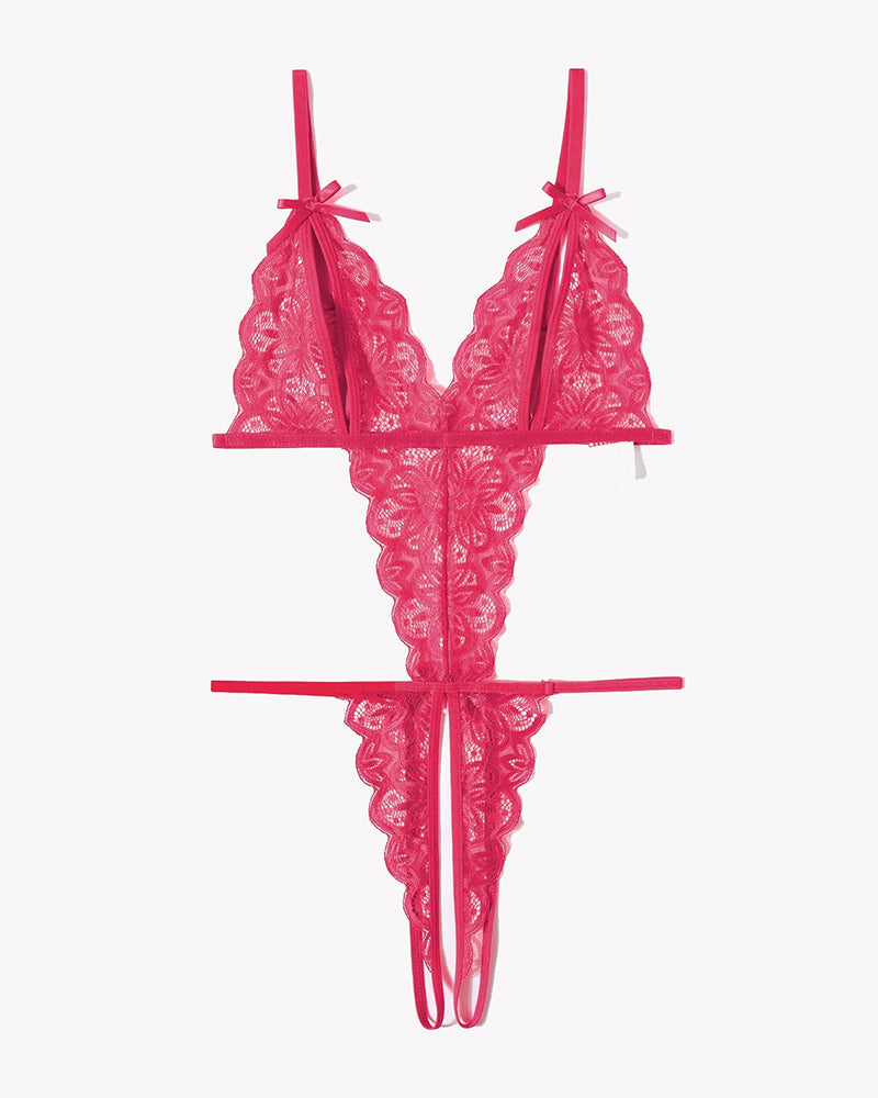 Pink lace deep V bodysuit with underwire, ribbon ties on straps, thong bottom.