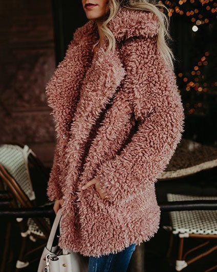 Oversized pink faux fur fleece coat with long sleeves and open front