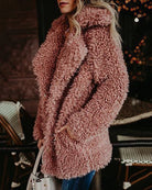 Oversized pink faux fur fleece coat with long sleeves and open front