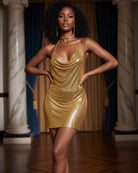 Gold backless halter metallic mini dress, draped cowl bodice.
