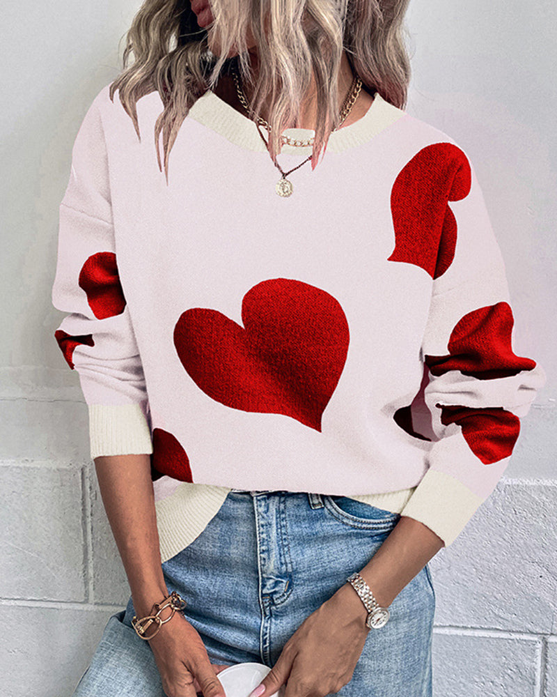 White knitted O-neck sweater with red heart pattern, long sleeves