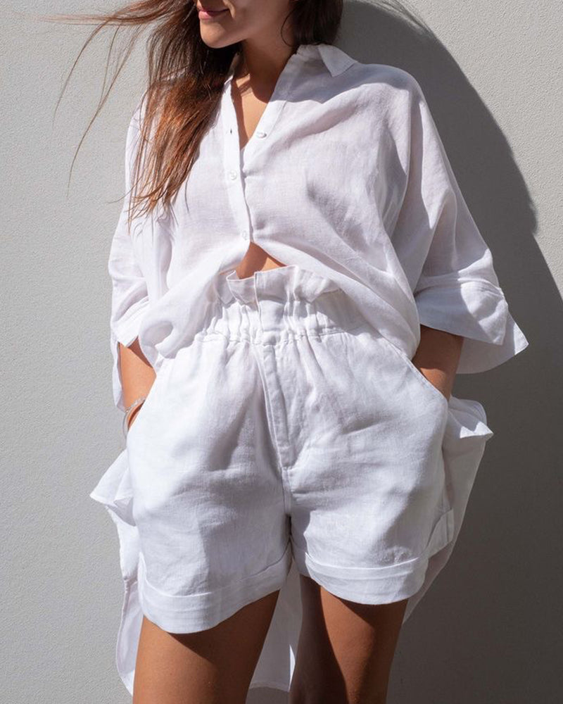 White button-up shirt and matching shorts set, V-neck collar, rolled sleeves