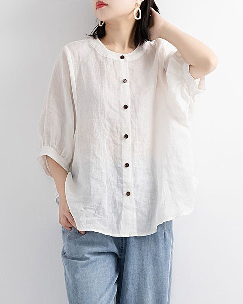 White lantern-sleeve loose shirt with button placket and round neckline