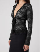 Black sheer lace cardigan, deep V tie-front detail and long sleeves