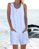 White sleeveless pocket shorts jumpsuit with button placket and scoop neckline