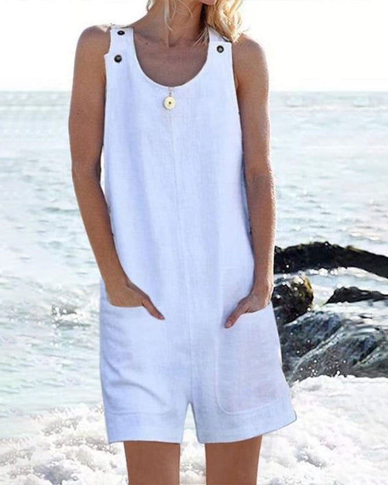 White sleeveless pocket shorts jumpsuit with button placket and scoop neckline