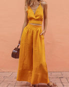 Yellow lace-up crop tank and long pants set, V-neck wrap bodice, wide-leg pants