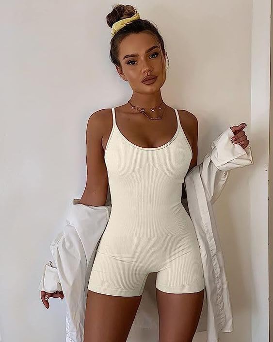 Beige ribbed tummy control romper with spaghetti straps and built-in shorts legs