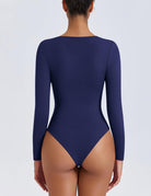 Navy back view long-sleeve bodysuit with V-back and high-cut legs