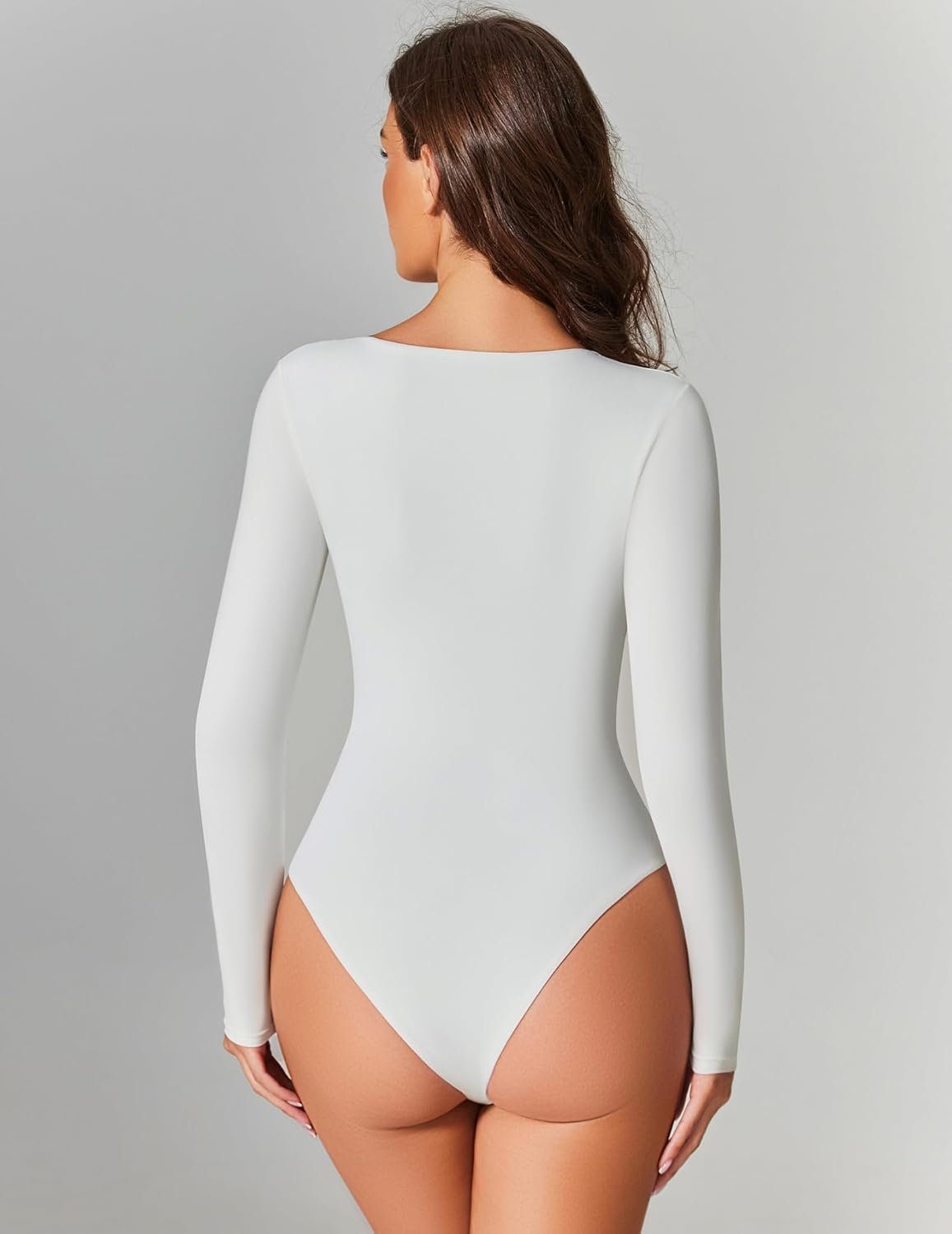 White sweetheart neckline bodysuit top with long sleeves, shown from the back