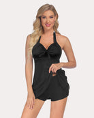 Halter black swimdress with ruched knot front and gathered side drape