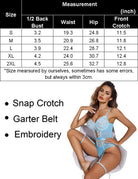 Light blue lace bodysuit with floral embroidery and garter belt straps, front view