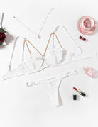 White chain-heart cutout bra and thong set with adjustable straps