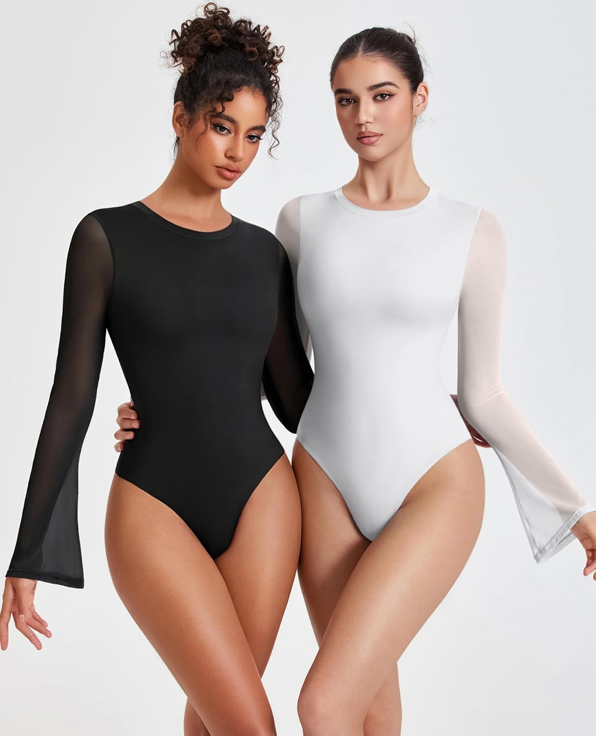 Black and white long sleeve mesh bodysuits with flared sleeves and high-cut legs.