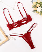 Red lace underwire bra and thong panty set, front view