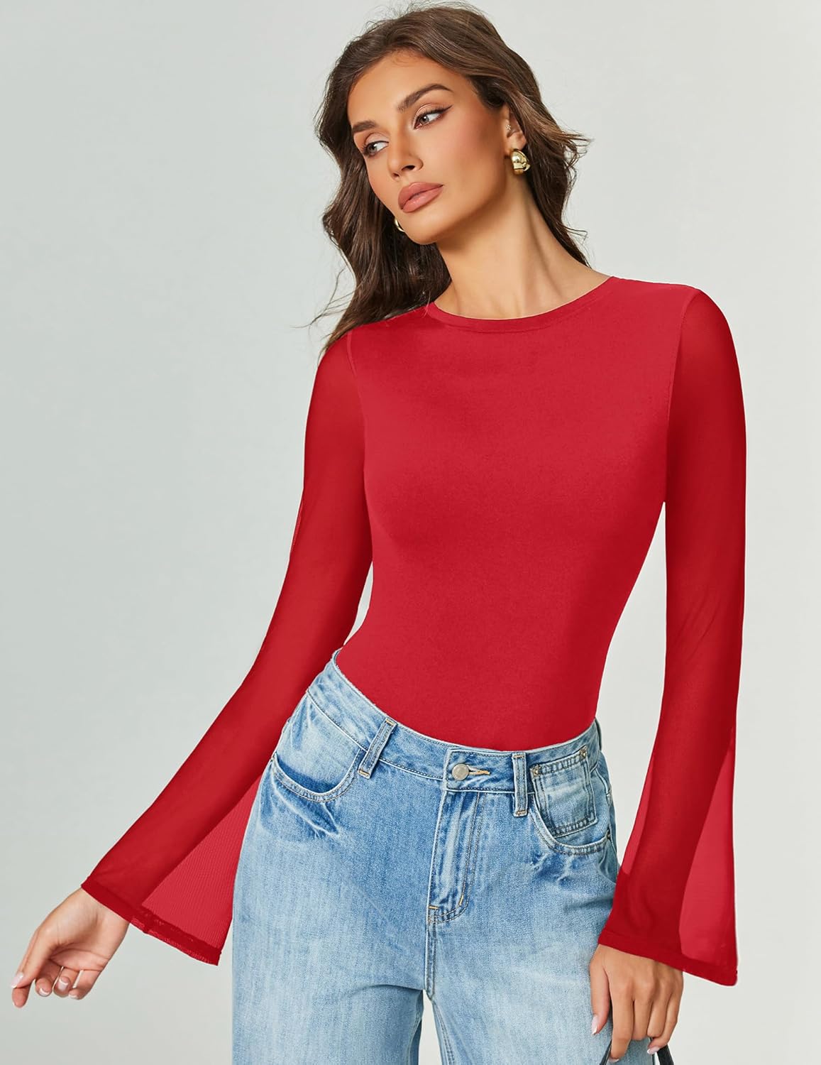 Red long sleeve mesh bodysuit with flared sleeves and high-cut leg opening.