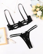Black lace underwire bra and matching thong set, sheer mesh lace and scalloped edges