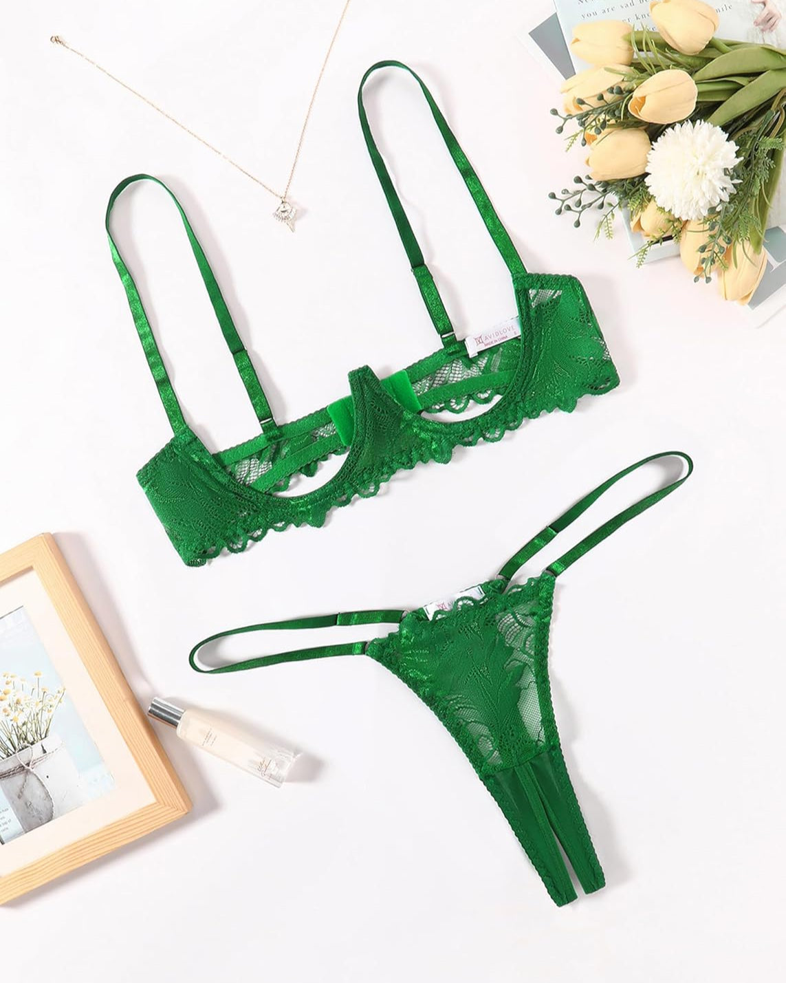 Green lace underwire bra and matching thong set, sheer lace texture with scallops