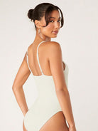 Beige ribbed tummy control romper, open back with thin adjustable straps and scoop back