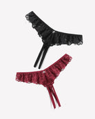 Lace thong briefs in black and burgundy with scalloped trim and crisscross ties
