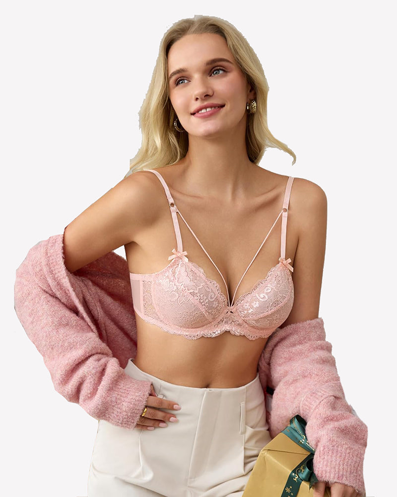 Pale pink lace unlined strappy bra with underwire, lace cups, and adjustable straps