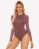 Mauve turtleneck mesh one-piece leotard with long sleeves