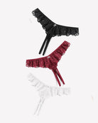 Lace thong briefs set: black, burgundy, and white with crisscross ribbon ties
