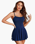 Navy blue strap chemise nightgown with scoop neckline and flared pleated skirt